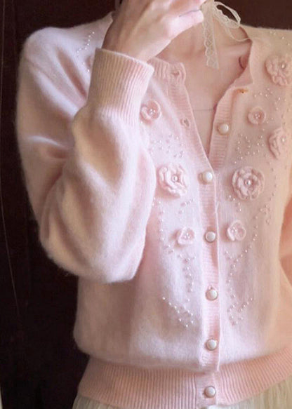 Hermoso cárdigan de punto con cuentas y decoración floral rosa para invierno