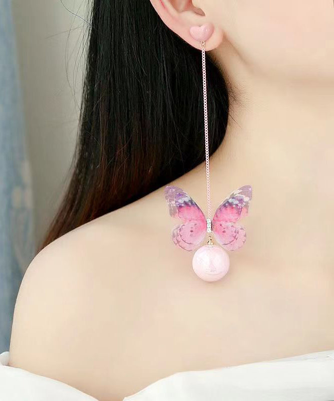 Hermosos aretes colgantes de mariposa con perla de amor en plata de ley rosa