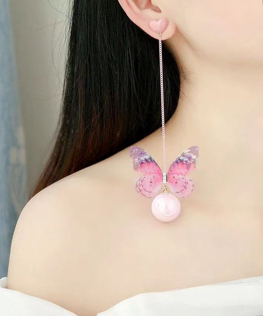 Hermosos aretes colgantes de mariposa con perla de amor en plata de ley rosa