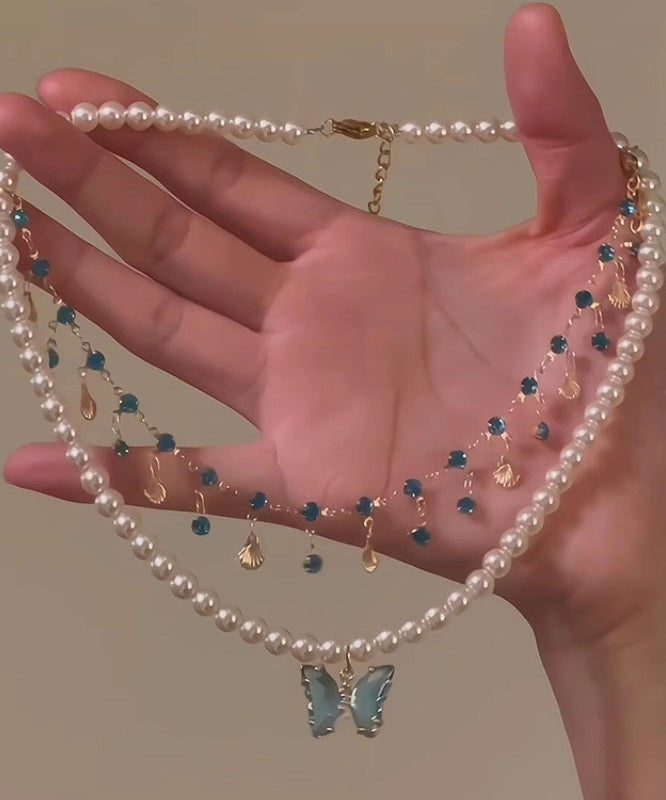 Wunderschöne Halskette mit Anhänger aus violetter Legierung mit Kristallquaste