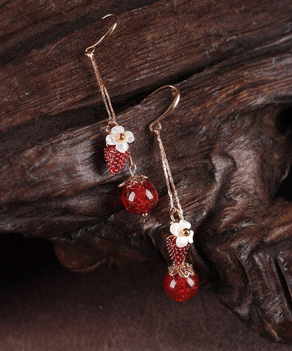 Hermosos aretes colgantes de flor de concha de fresa con esmalte cloisonné de cobre rojo