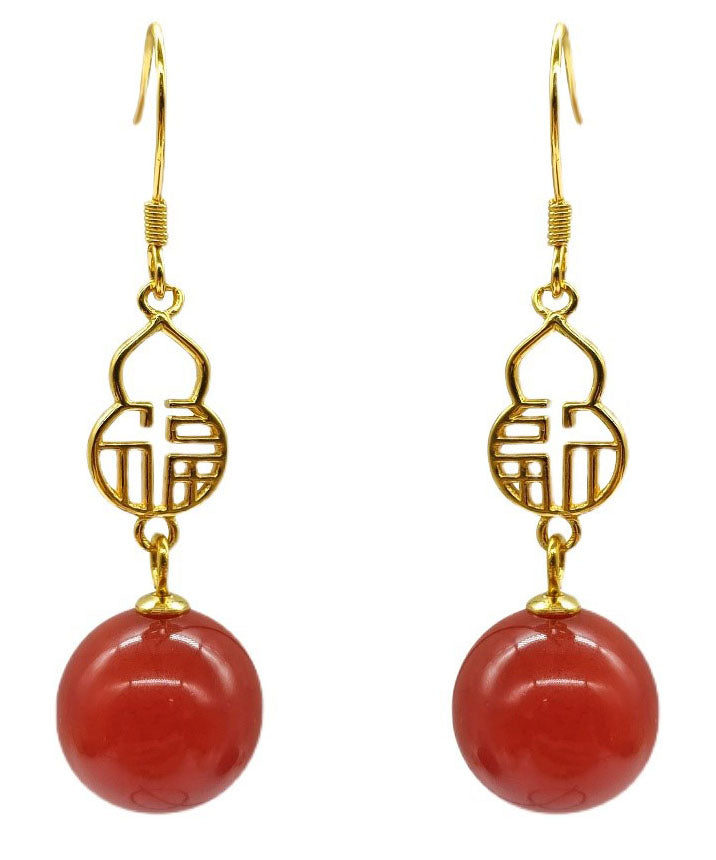 Hermosos aretes colgantes con diseño gráfico de ágata dorada en plata de ley roja