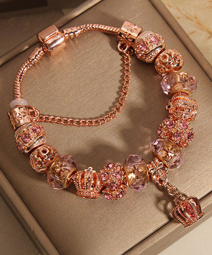 Hermosa pulsera con dije de borla de corona de cristal de plata esterlina y oro rosa