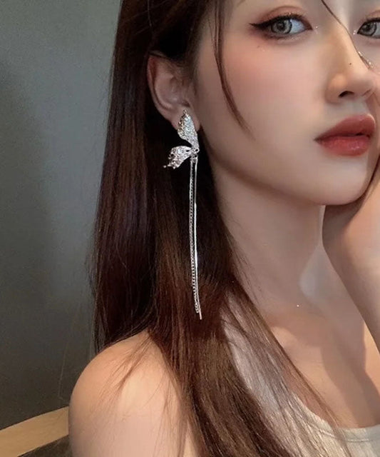 Wunderschöne Ohrringe mit Schmetterlingsquaste aus Seide und Kupferlegierung