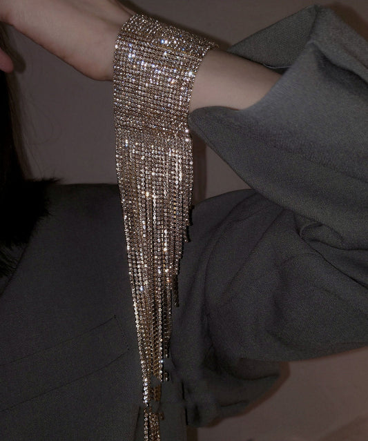 Hermosa pulsera de cadena con borlas de circonitas de seda