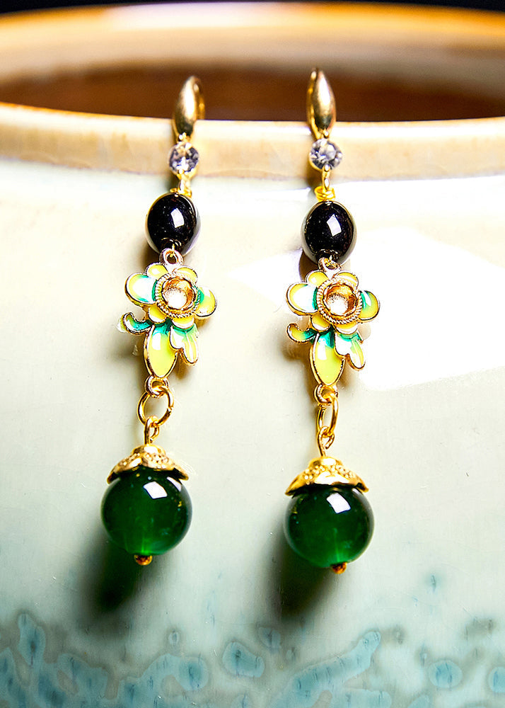 Hermosos aretes colgantes de flores finas de color turquesa