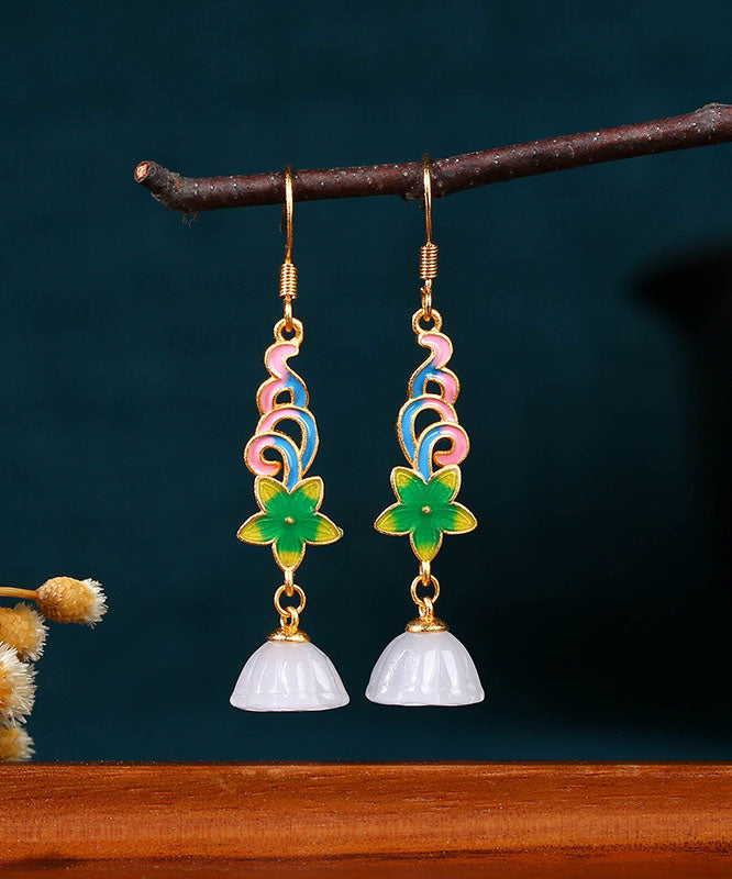 Hermosos aretes colgantes con forma de vaina de loto floral dorados en cobre blanco