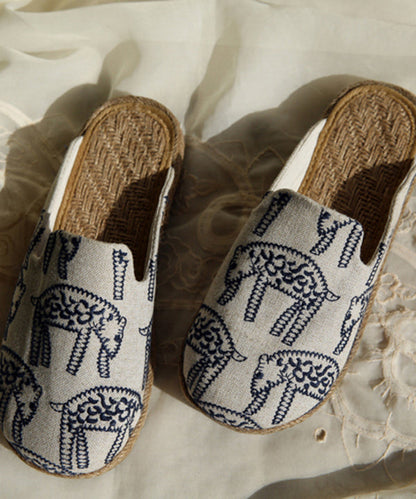 Bequeme Slide-Sandalen aus besticktem Baumwollstoff in Beige