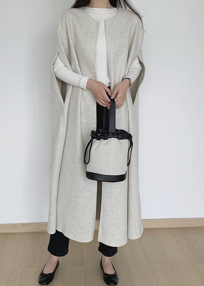 Chaleco largo de lana lisa beige con cuello redondo para invierno