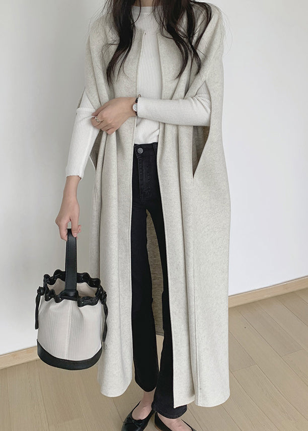 Chaleco largo de lana lisa beige con cuello redondo para invierno