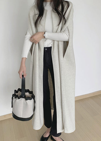 Chaleco largo de lana lisa beige con cuello redondo para invierno