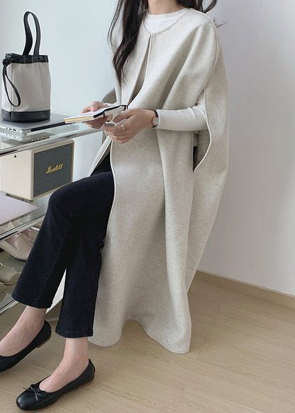 Chaleco largo de lana lisa beige con cuello redondo para invierno