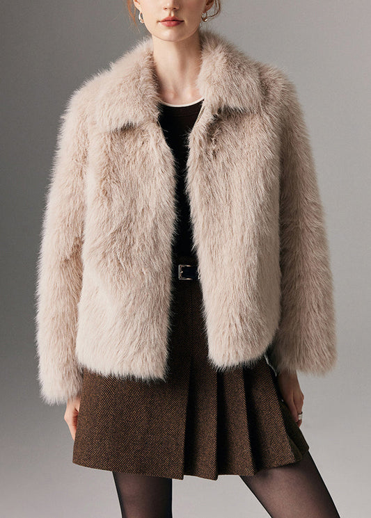 Abrigo de invierno de piel y cuero beige con bolsillos y cremallera y cuello Peter Pan