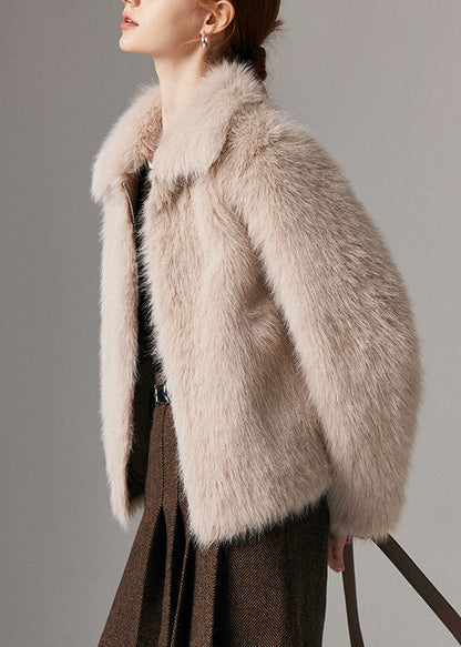 Abrigo de invierno de piel y cuero beige con bolsillos y cremallera y cuello Peter Pan