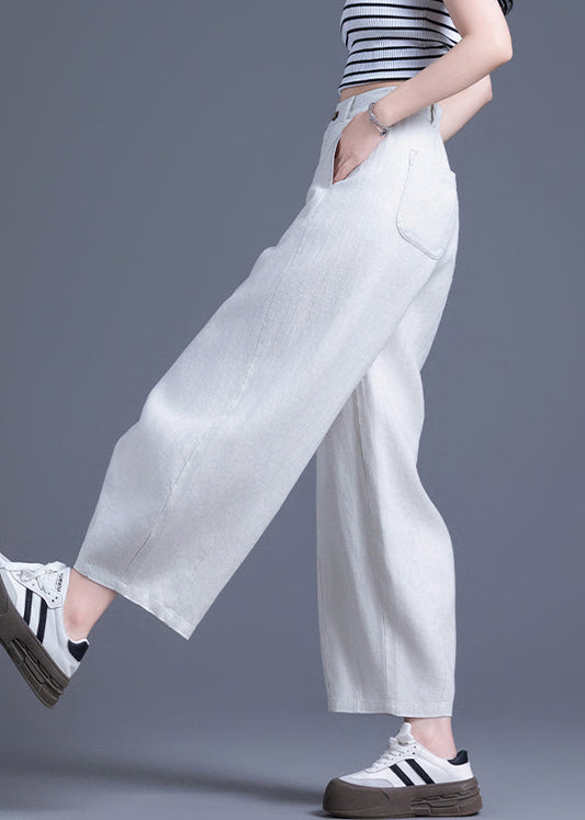 Beige Leinenhose mit Reißverschluss, elastischem Bund und weitem Bein