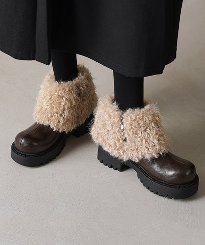 Schwarze, klobige Stiefel aus Rindsleder mit flauschigem Wollfutter