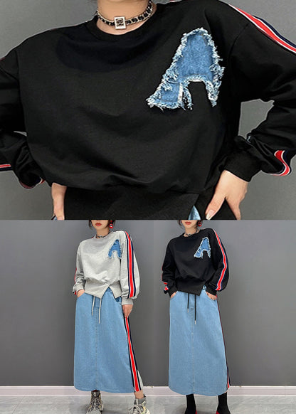 Schwarzer O-Ausschnitt gestreifter Pullover und Röcke Zweiteiliger Anzug