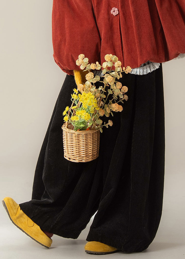 Pantalones de pana negros de diseño original y acogedores de cintura alta para invierno.