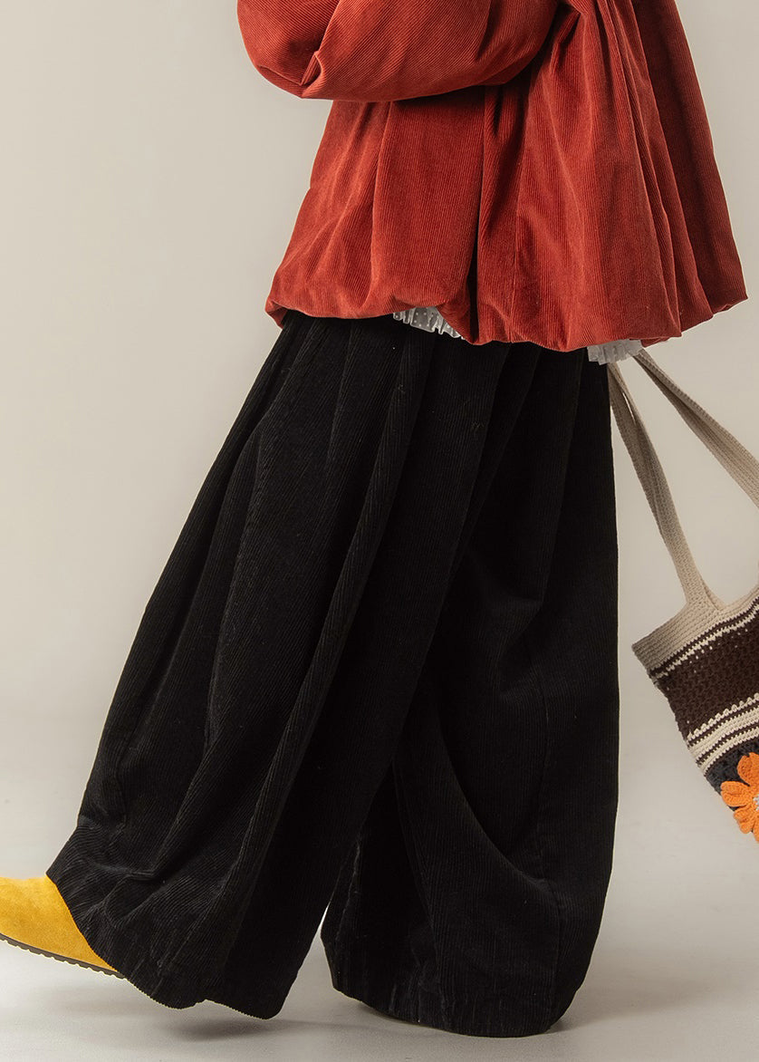 Pantalones de pana negros de diseño original y acogedores de cintura alta para invierno.