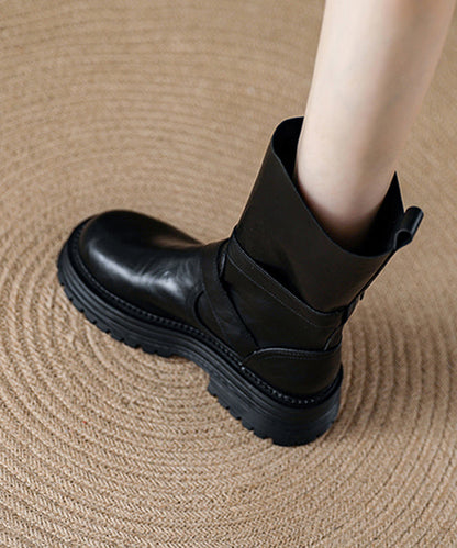 Botas negras con plataforma y empalme de piel sintética