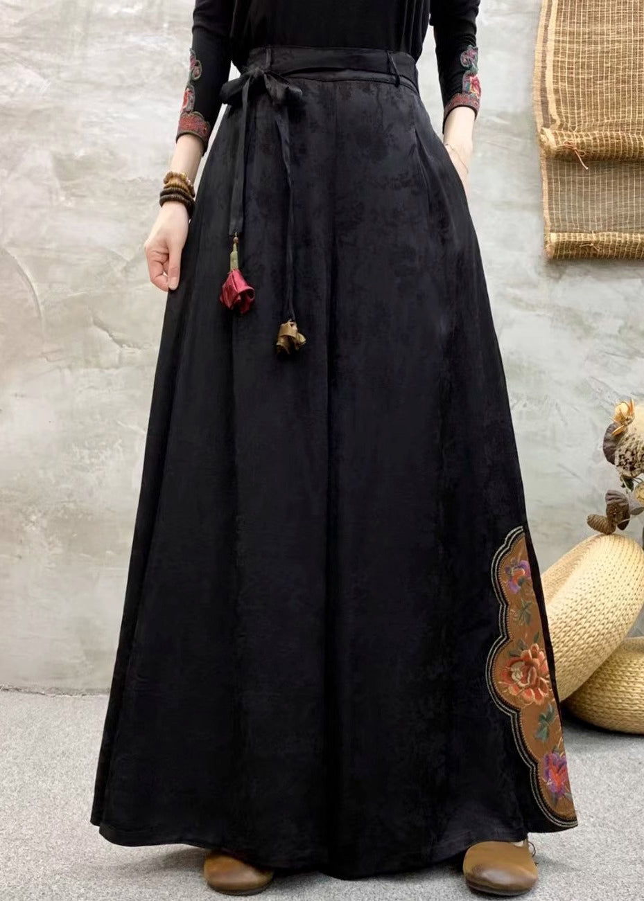 Schwarze Seidenhose mit Taschen, besticktem elastischem Bund, Herbst