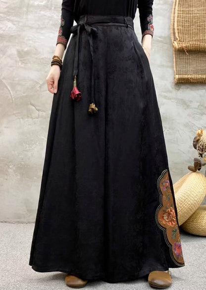 Schwarze Seidenhose mit Taschen, besticktem elastischem Bund, Herbst