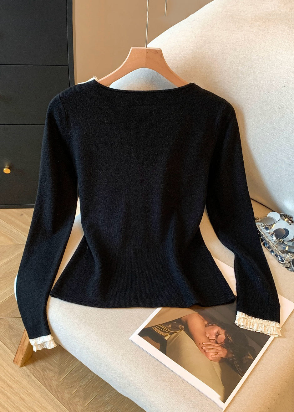 Schwarzes, gerüschtes Patchwork-T-Shirt aus Strickbaumwolle mit V-Ausschnitt für den Herbst