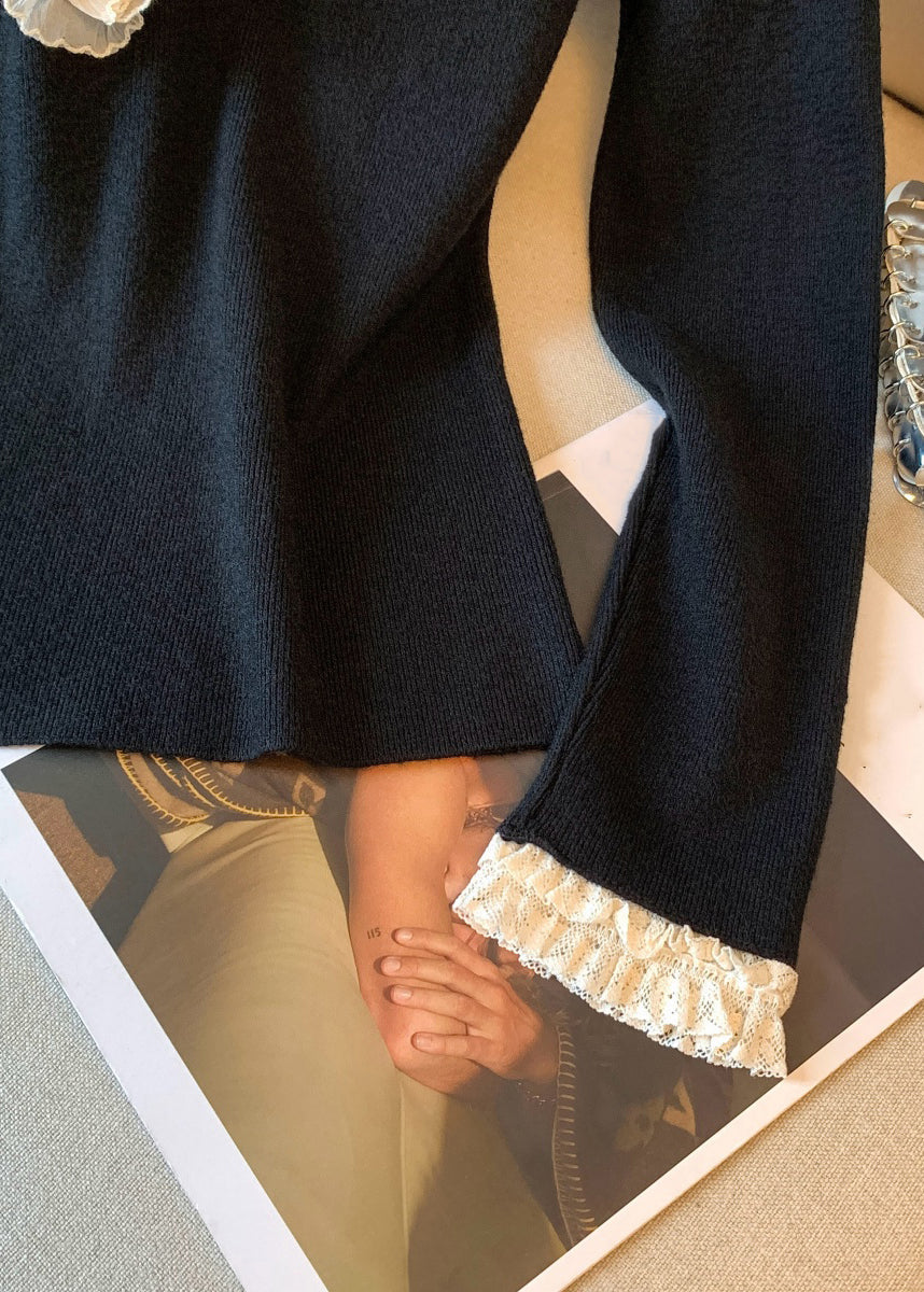 Schwarzes, gerüschtes Patchwork-T-Shirt aus Strickbaumwolle mit V-Ausschnitt für den Herbst