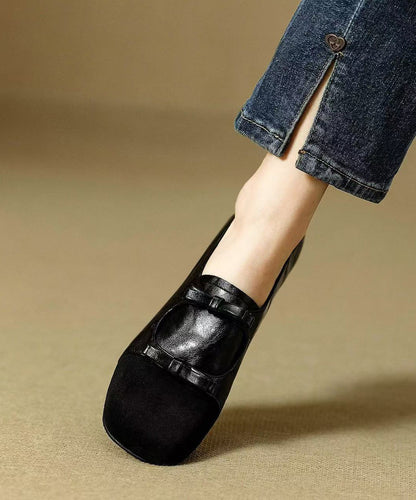 Schwarze, klobige High Heels aus Schaffell mit Wildleder-Schleife