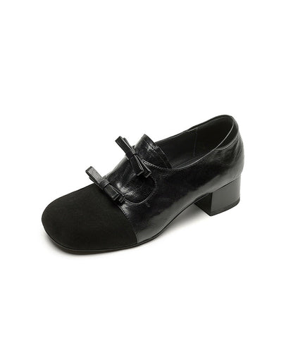 Schwarze, klobige High Heels aus Schaffell mit Wildleder-Schleife