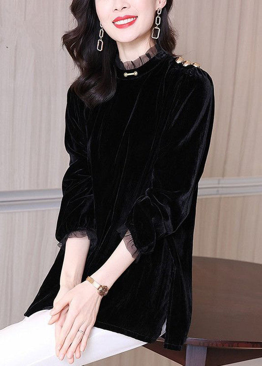 Blusa de terciopelo de seda negra con abertura lateral y mangas abullonadas
