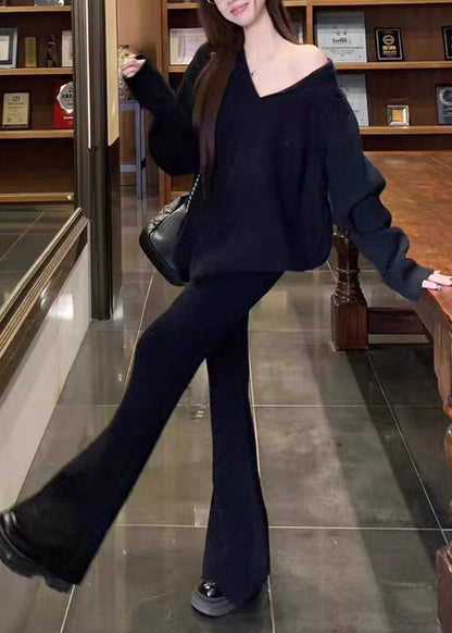 Schwarzer Strickpullover und ausgestellte Hose, zweiteiliges Set mit V-Ausschnitt