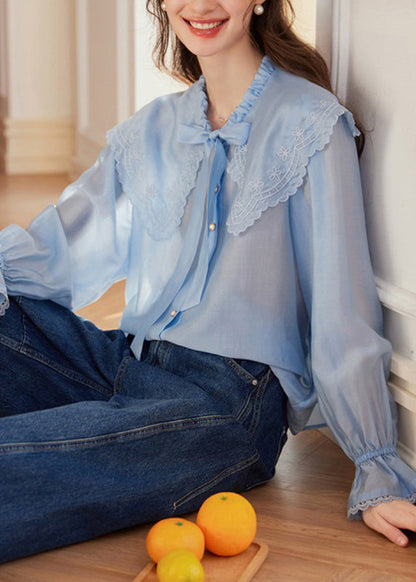 Tops de encaje con lazo floral bordado en azul para primavera