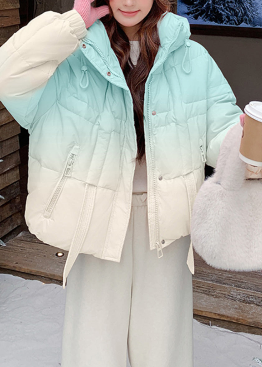 Abrigo acolchado de plumón de pato con capucha, bolsillos y cordón ajustable en color azul degradado