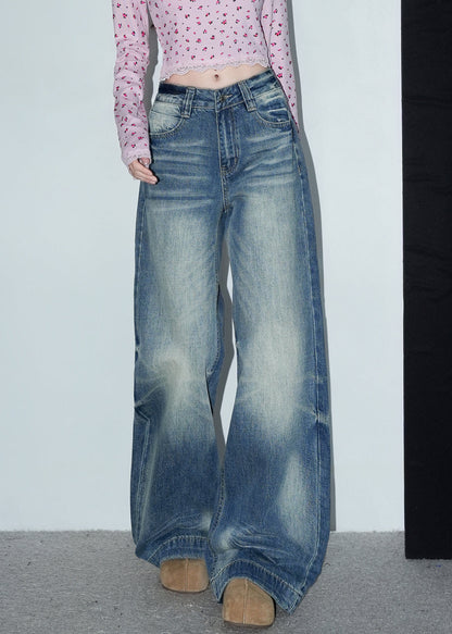 Blaue Jeans mit Taschen, weitem Bein und hohem Bund für den Frühling