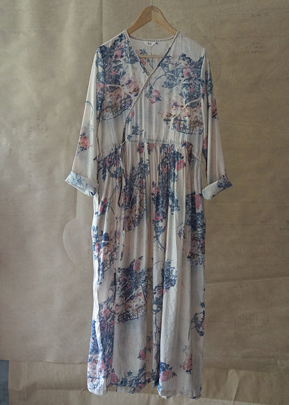 Blaues, bedrucktes, langes Urlaubskleid mit Bindegürtel, V-Ausschnitt, lange Ärmel