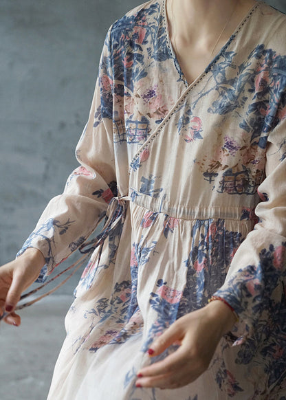 Blaues, bedrucktes, langes Urlaubskleid mit Bindegürtel, V-Ausschnitt, lange Ärmel