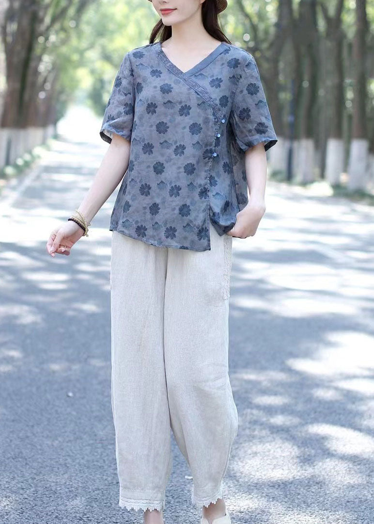 Blau bedruckte Patchwork-Leinenbluse mit V-Ausschnitt und kurzen Ärmeln