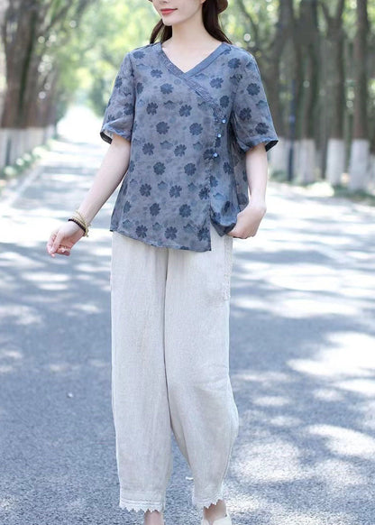 Blau bedruckte Patchwork-Leinenbluse mit V-Ausschnitt und kurzen Ärmeln