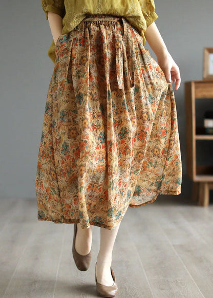 Falda de lino con estampado azul, bolsillos y patchwork, cintura arrugada con lazo, verano