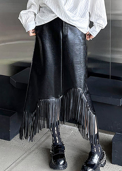 Schwarzer, hochtaillierter A-Linien-Rock im Boho-Stil mit Quasten-Patchwork aus Kunstleder für den Herbst