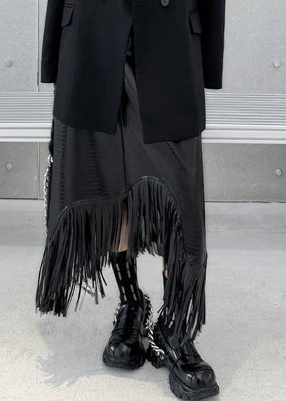 Schwarzer, hochtaillierter A-Linien-Rock im Boho-Stil mit Quasten-Patchwork aus Kunstleder für den Herbst