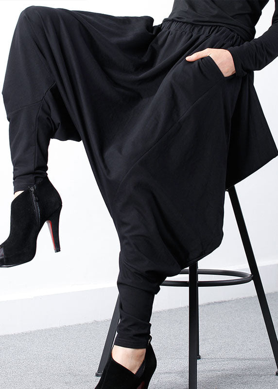 Bohemian Schwarze Jogginghose mit asymmetrischem Reißverschluss und Frühlings-Design