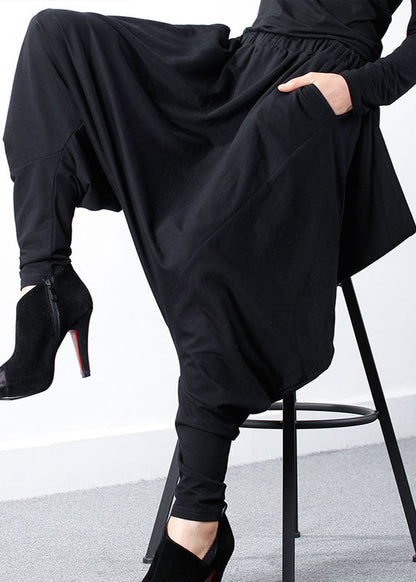 Bohemian Schwarze Jogginghose mit asymmetrischem Reißverschluss und Frühlings-Design