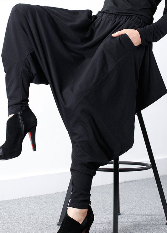 Bohemian Schwarze Jogginghose mit asymmetrischem Reißverschluss und Frühlings-Design