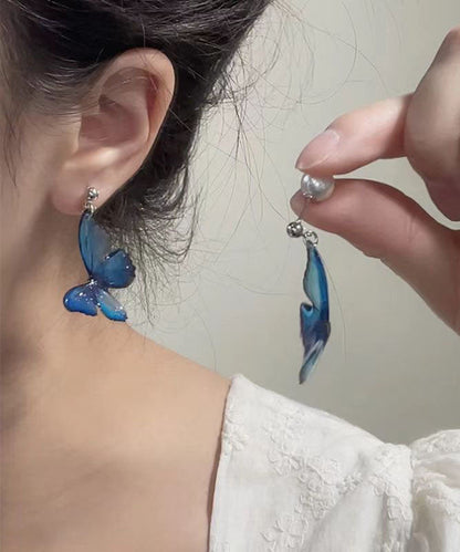 Pendientes colgantes de mariposa con perlas de aleación de cobre azul bohemio
