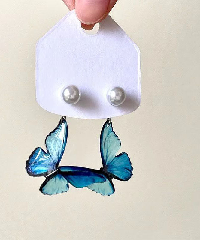 Pendientes colgantes de mariposa con perlas de aleación de cobre azul bohemio