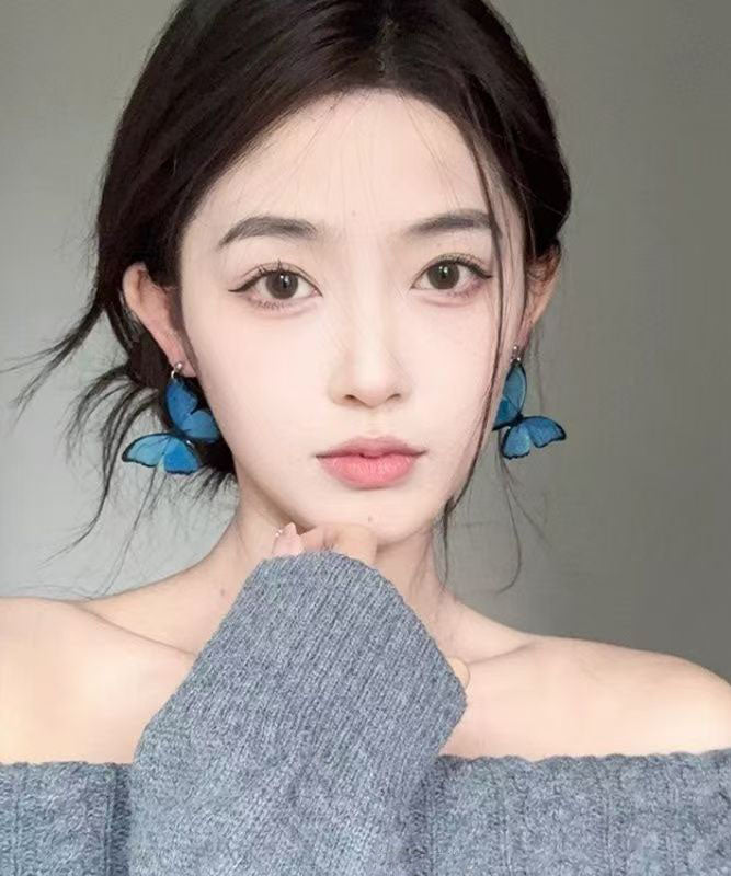 Pendientes colgantes de mariposa con perlas de aleación de cobre azul bohemio