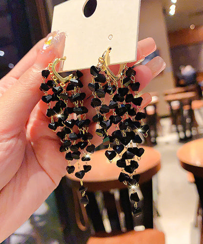 Pendientes bohemios con borlas de amor y cristales dorados en plata de ley negra