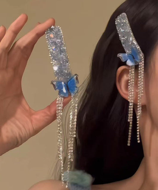 Par de horquillas con borlas de mariposa de circonita de aleación azul bohemia